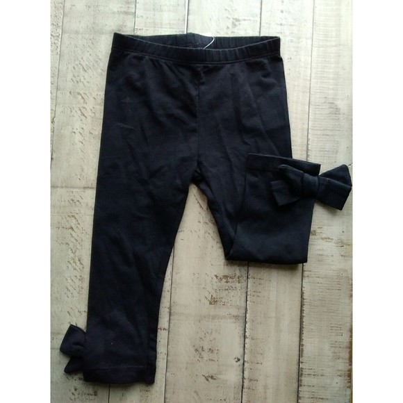 New FIRST IMPRESSIONS Black BABY GIRL'S Bottom bow Leggings Size 18m cotton - Picture 1 of 3